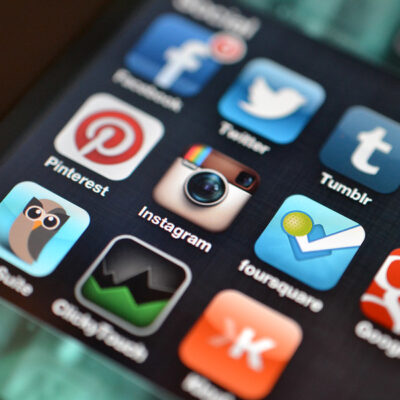 Image shows a variety of social media apps on a person's phone