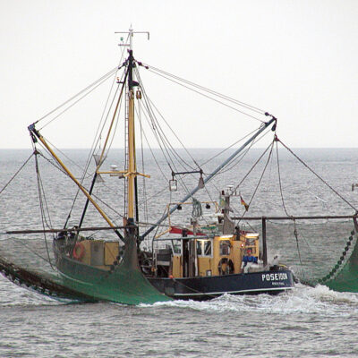 Image is a commercial fishing boat on the water