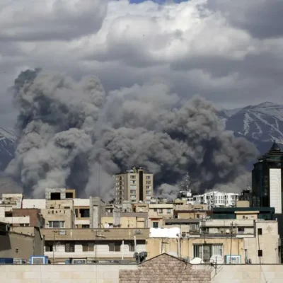 Image of Tehran with an explosion in the background from March 1