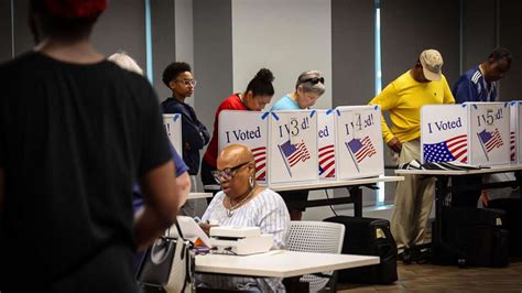 Interior of a polling place with voting booths